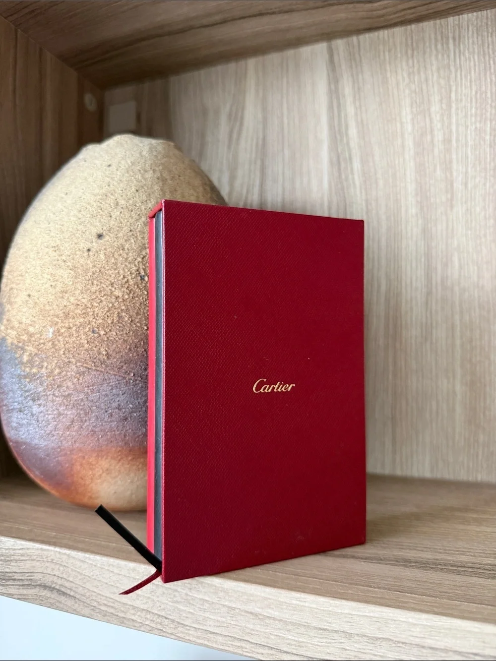 Cartier Red and Black Hardcover Notebooks with Gold Accents